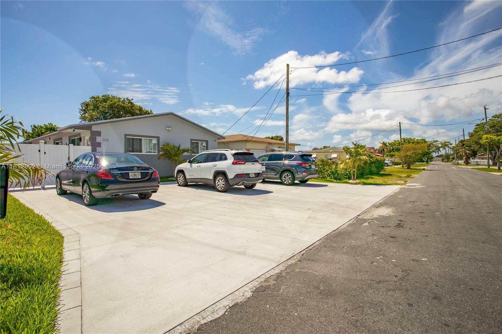 Property Photo:  608 NW 4th Ave A  FL 33009 