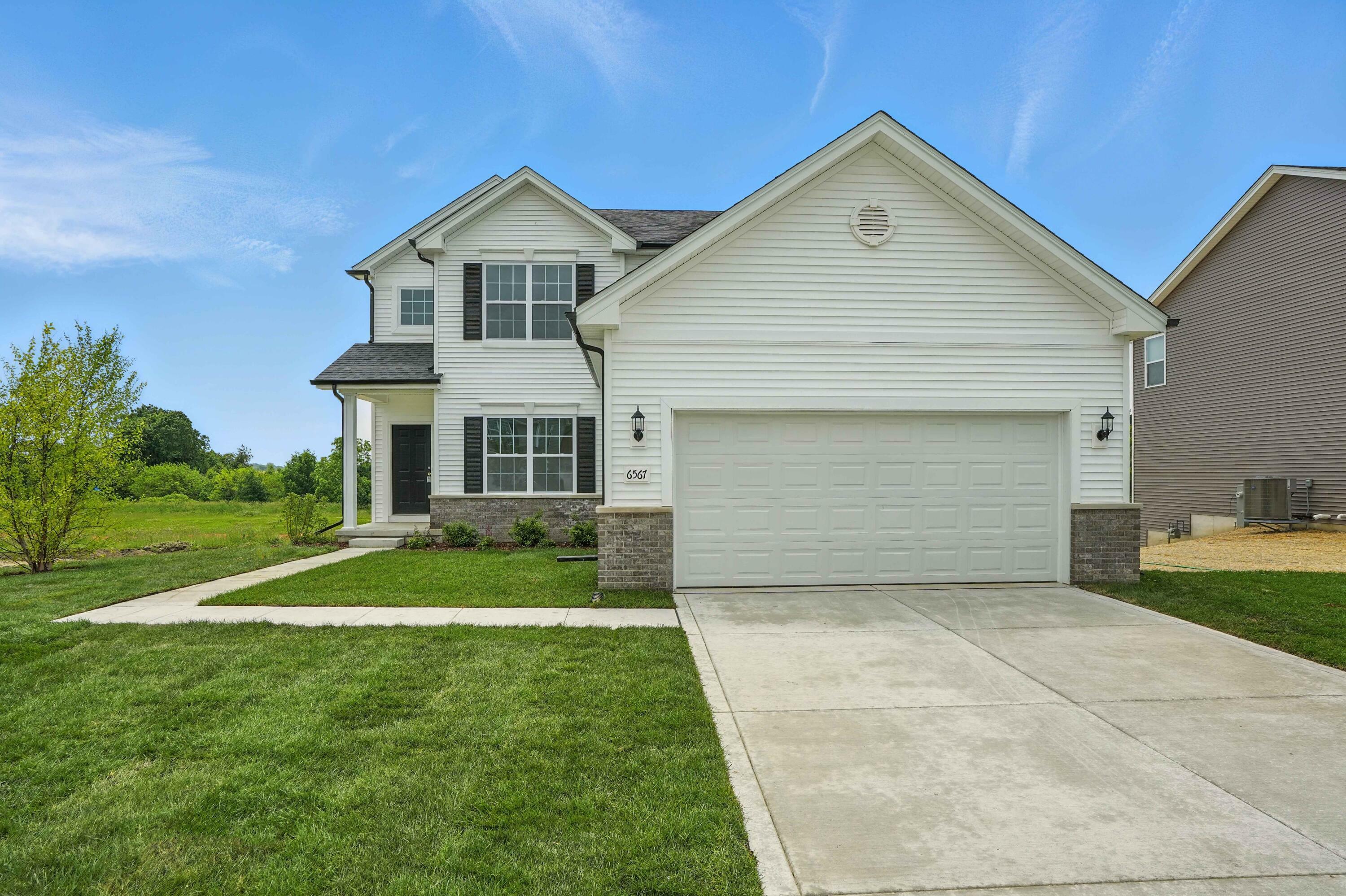 Property Photo: 6567 E 104th Avenue IN 46307