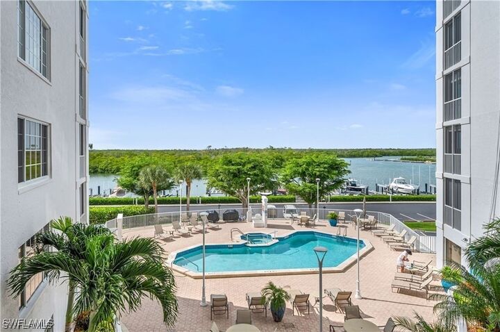 Property Photo:  13105 Vanderbilt Drive 808  FL 34110 