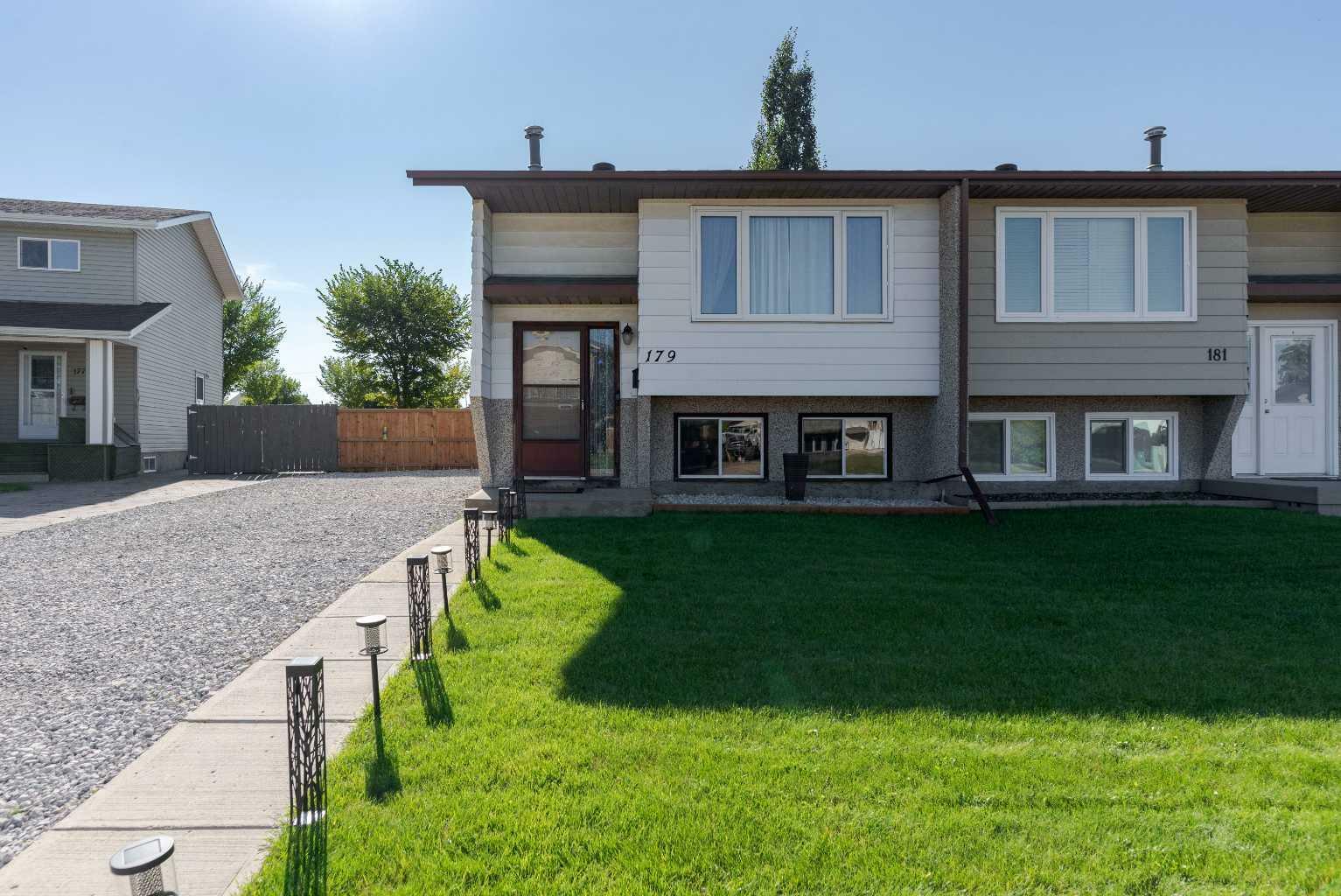 Property Photo: 179 Cochrane Crescent AB T9K 1H1