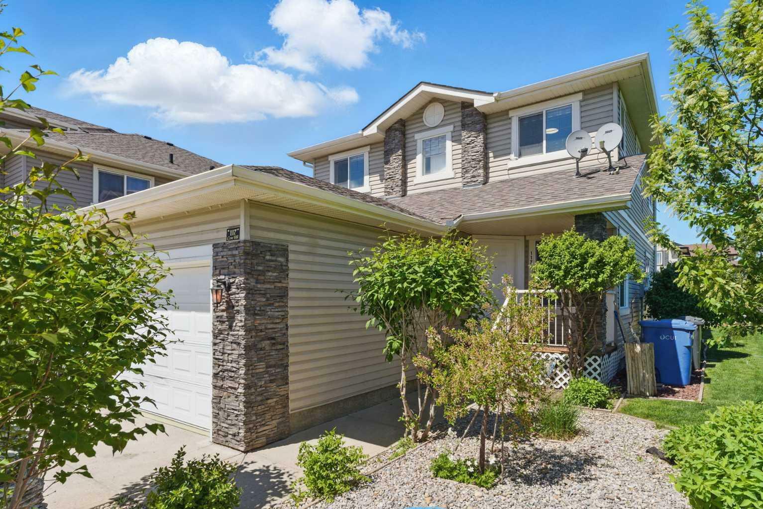 Property Photo: 117 Cove Hill AB T1X 1S7