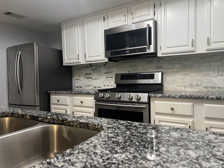 Property Photo:  6477 Tippin Ave  FL 32504 