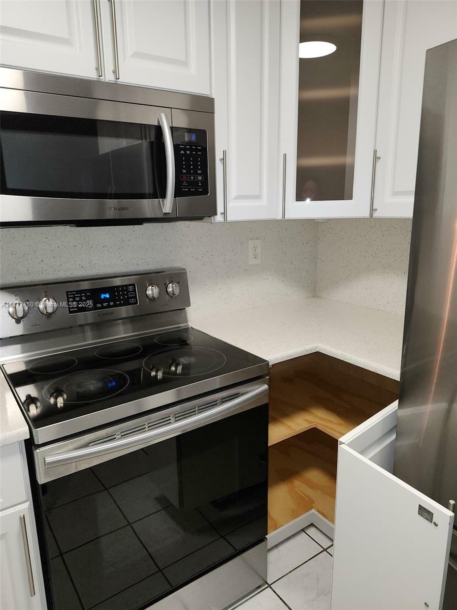 Property Photo: 325 NW 72nd Ave 103 FL 33126