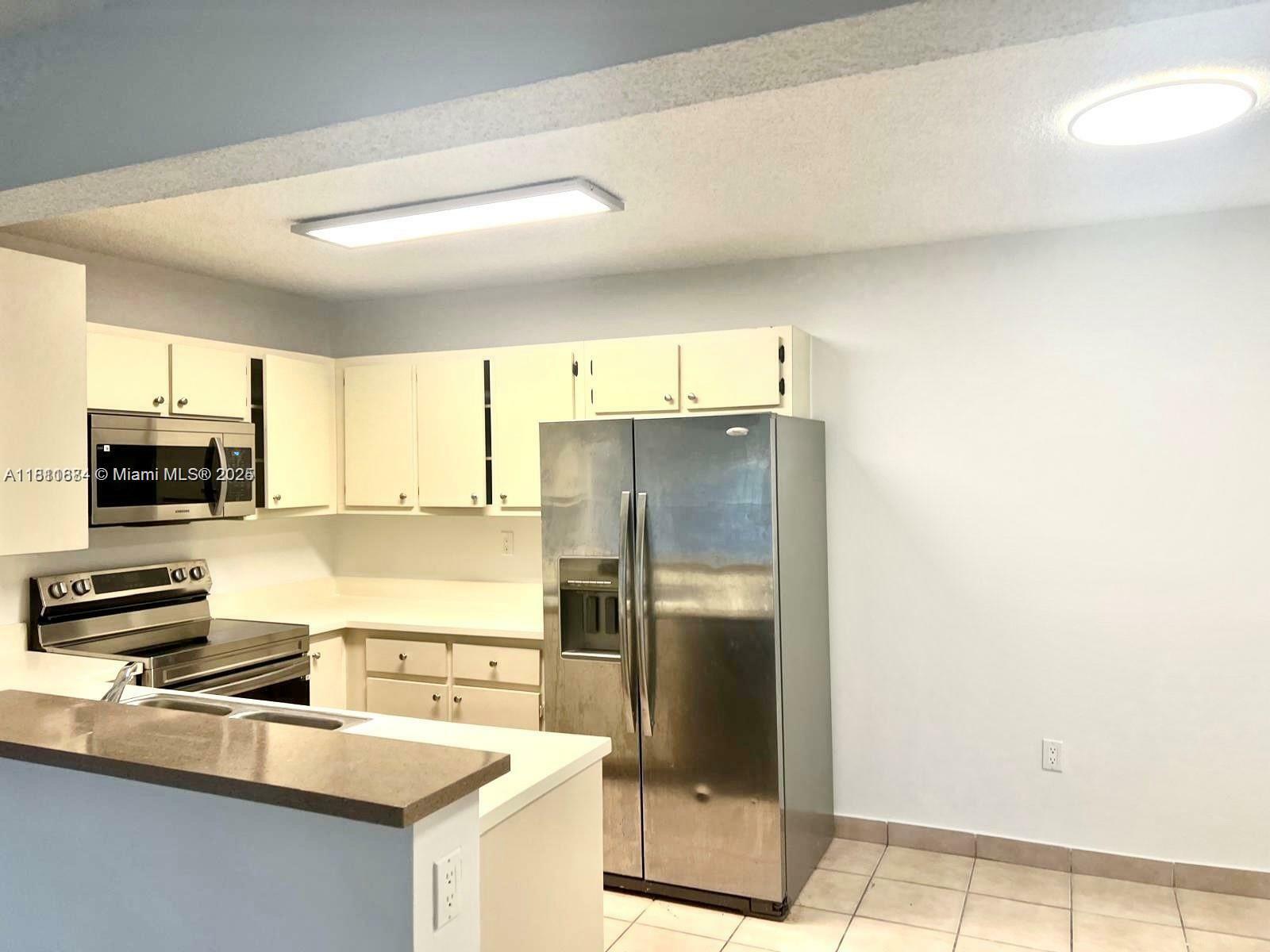 Property Photo: 200 W Palm Cir W 202 FL 33025