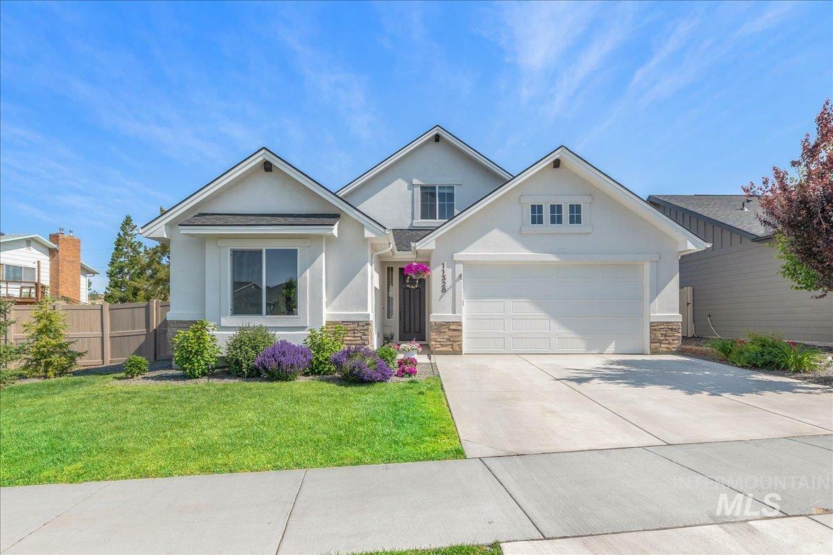 Property Photo: 11328 W Campanula Dr. ID 83669