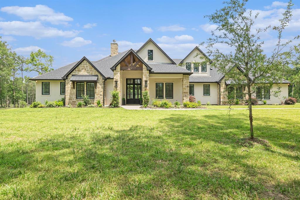 Property Photo: 10102 Woodlane Boulevard TX 77354
