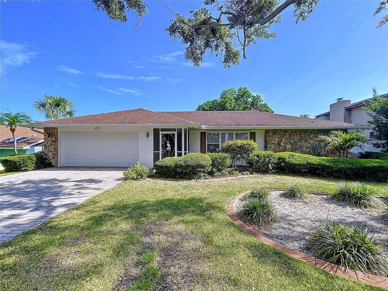 Property Photo: 13725 Oak Forest Boulevard N FL 33776