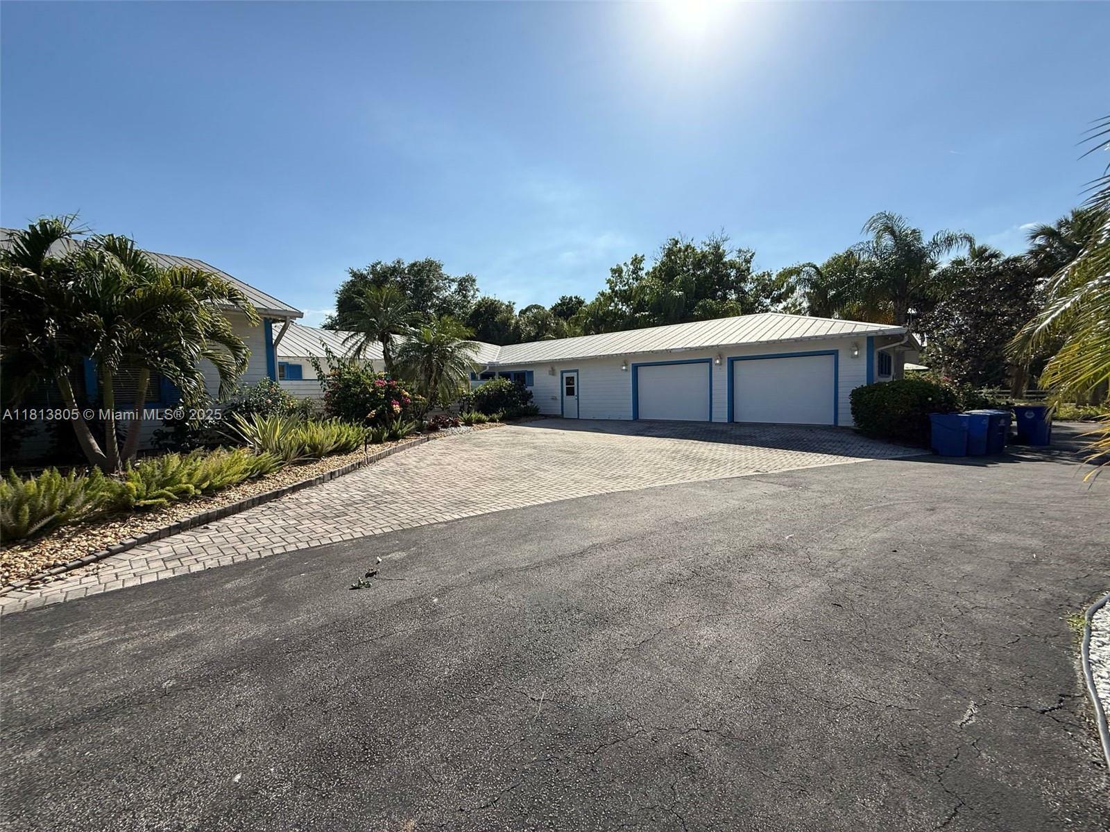 Property Photo:  5584 SW Quail Hollow St  FL 34990 
