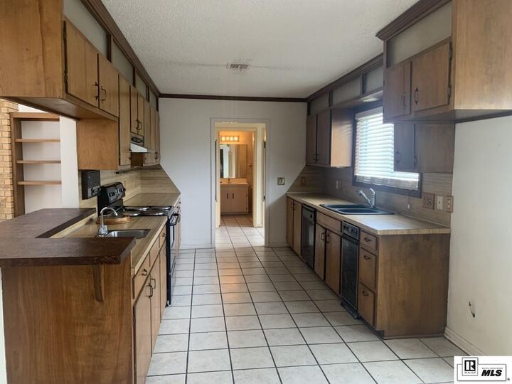 Property Photo:  6504 Cypress Point Drive  LA 71203 