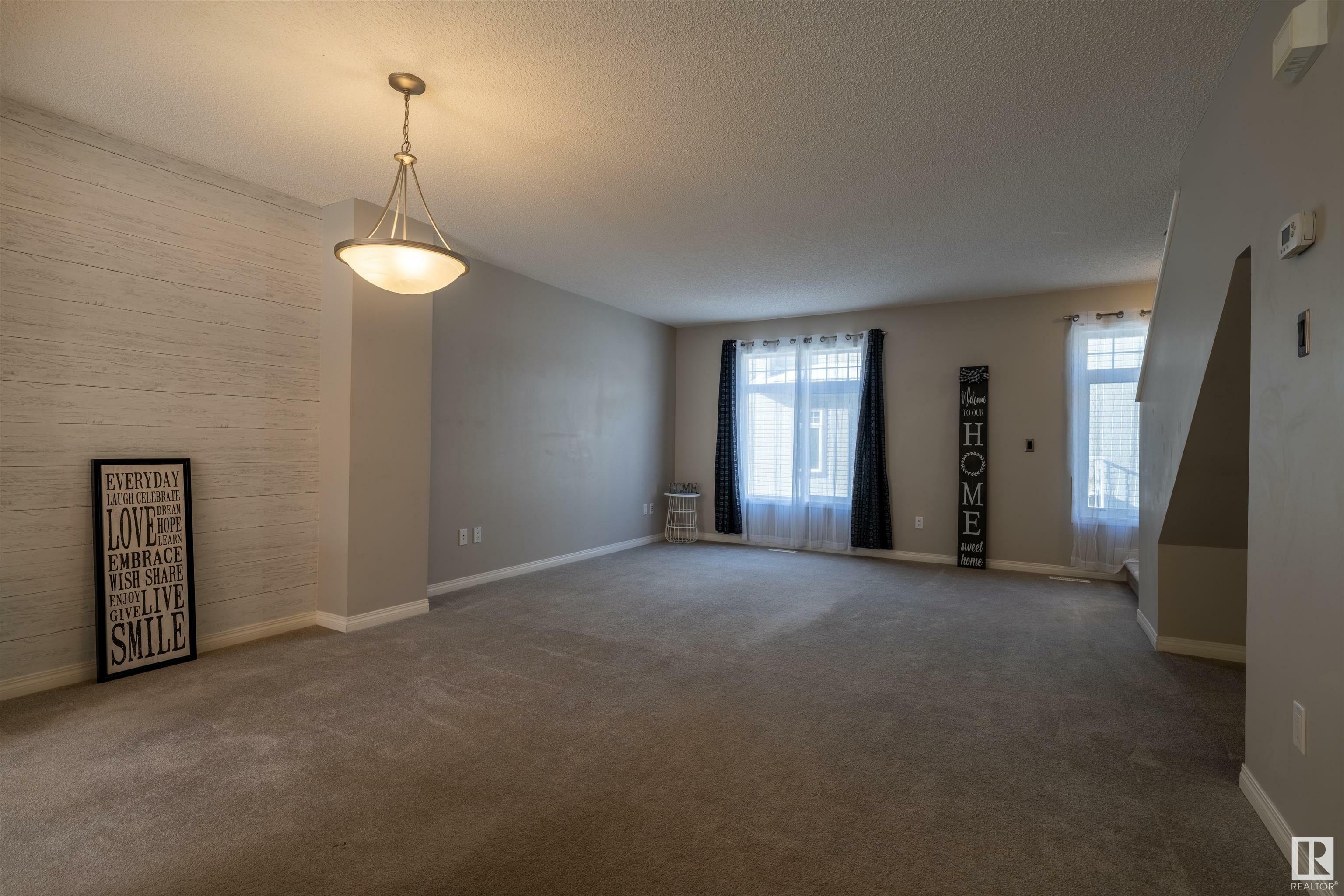 Property Photo: 465 Hemingway Road NW 97 AB T6M 0J7