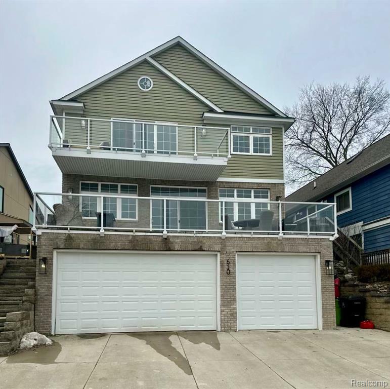 Property Photo: 610 Longpointe Drive MI 48362 2343