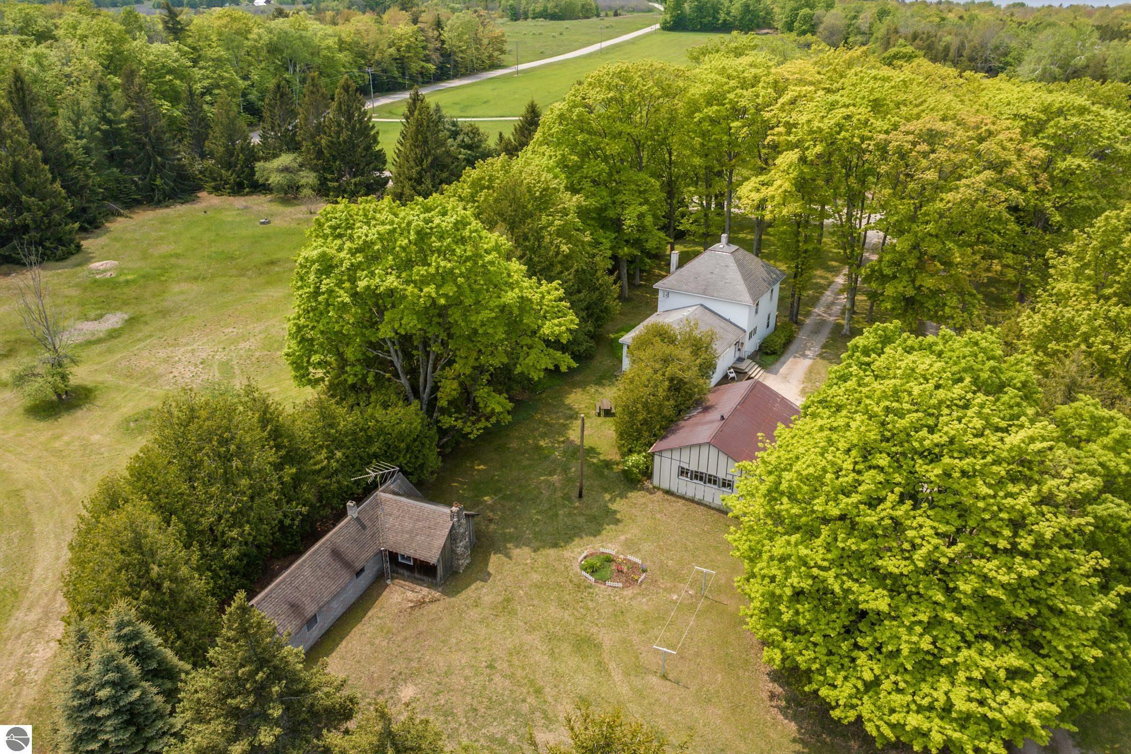 Property Photo:  12570 N Cathead Point Road  MI 49670 