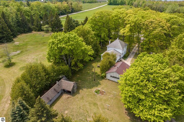 Property Photo:  12570 N Cathead Point Road  MI 49670 