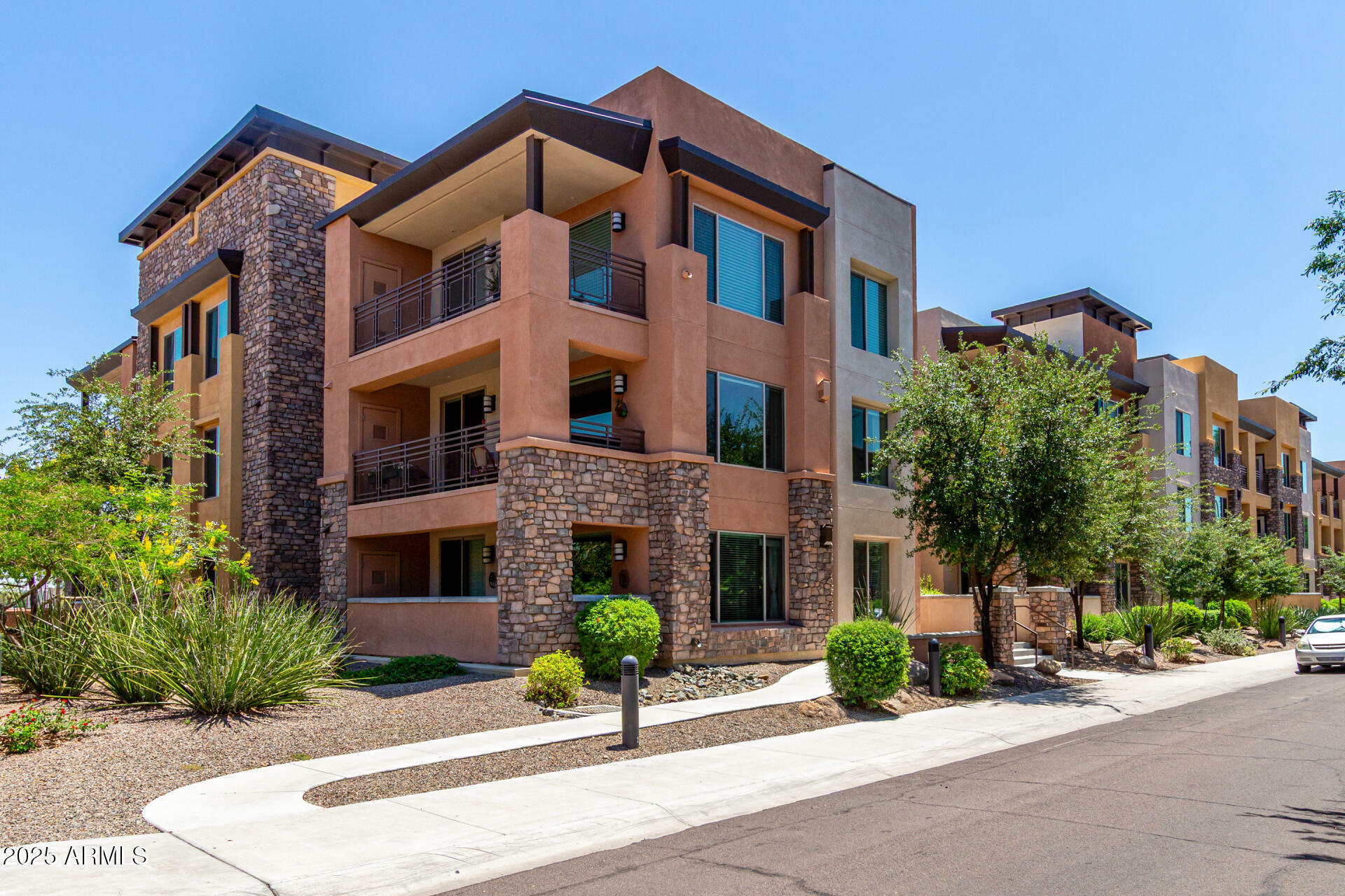 Property Photo:  4803 N Woodmere Fairway -- 1002  AZ 85251 