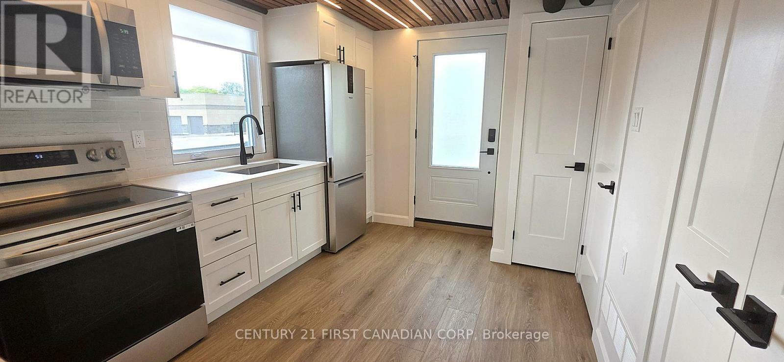 Property Photo: 857 Dundas Street 3 ON N5W 2Z8