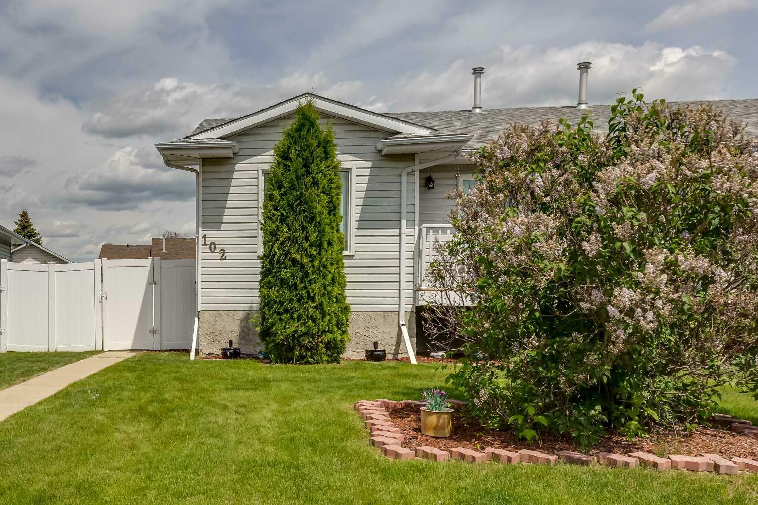 Property Photo: 102 Excell Street AB T2R 2H8