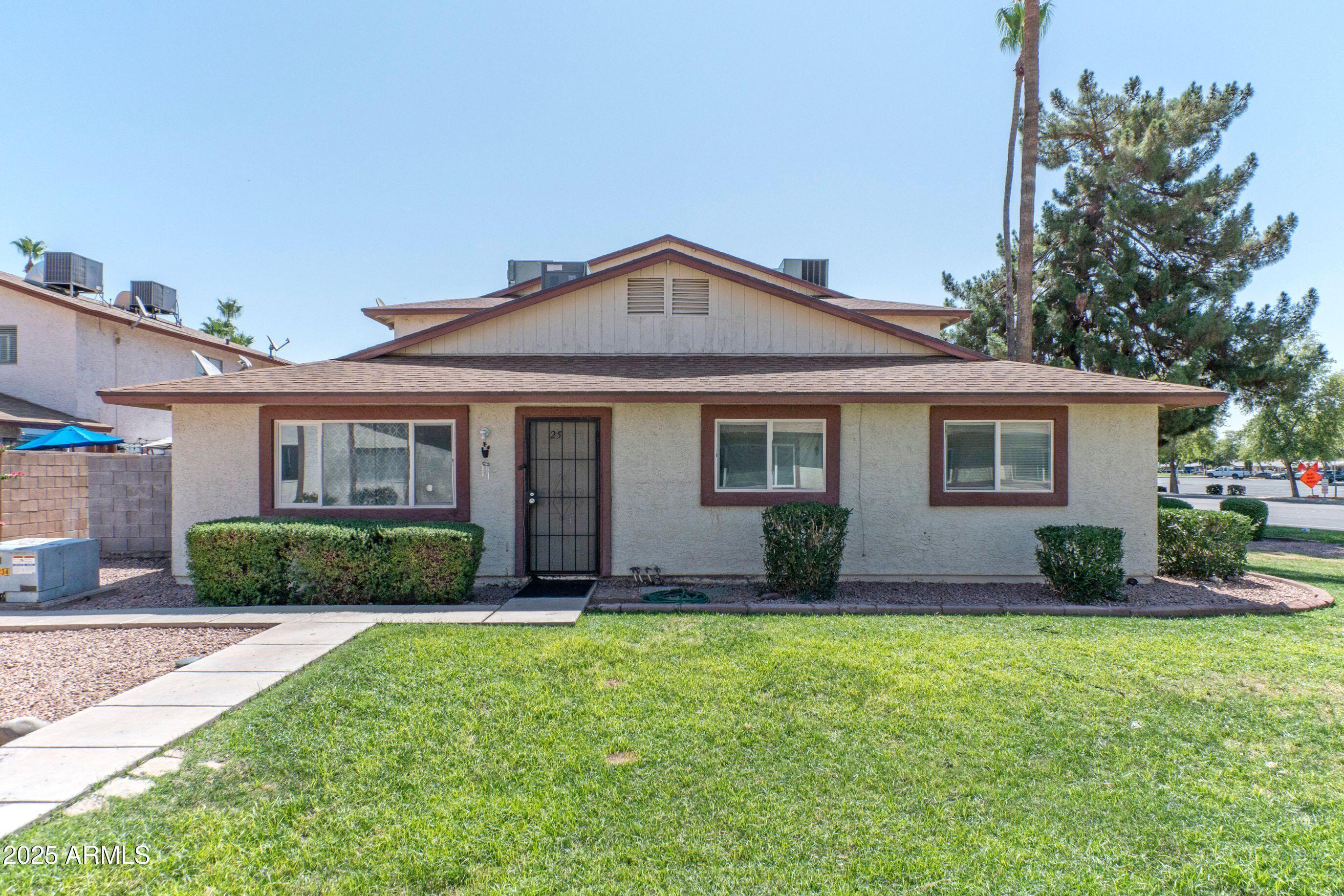 Property Photo: 860 E Brown Road 25 AZ 85203