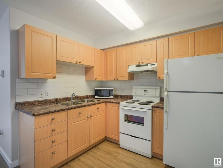 Property Photo:  8802 Southfort Drive 318  AB T8L 4R6 