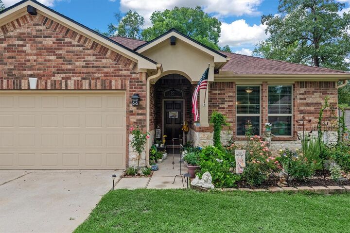 Property Photo:  9171 Whitetail Drive  TX 77303 