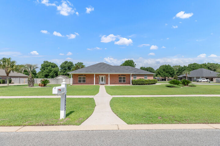 Property Photo:  5552 Frontier Drive  FL 32536 