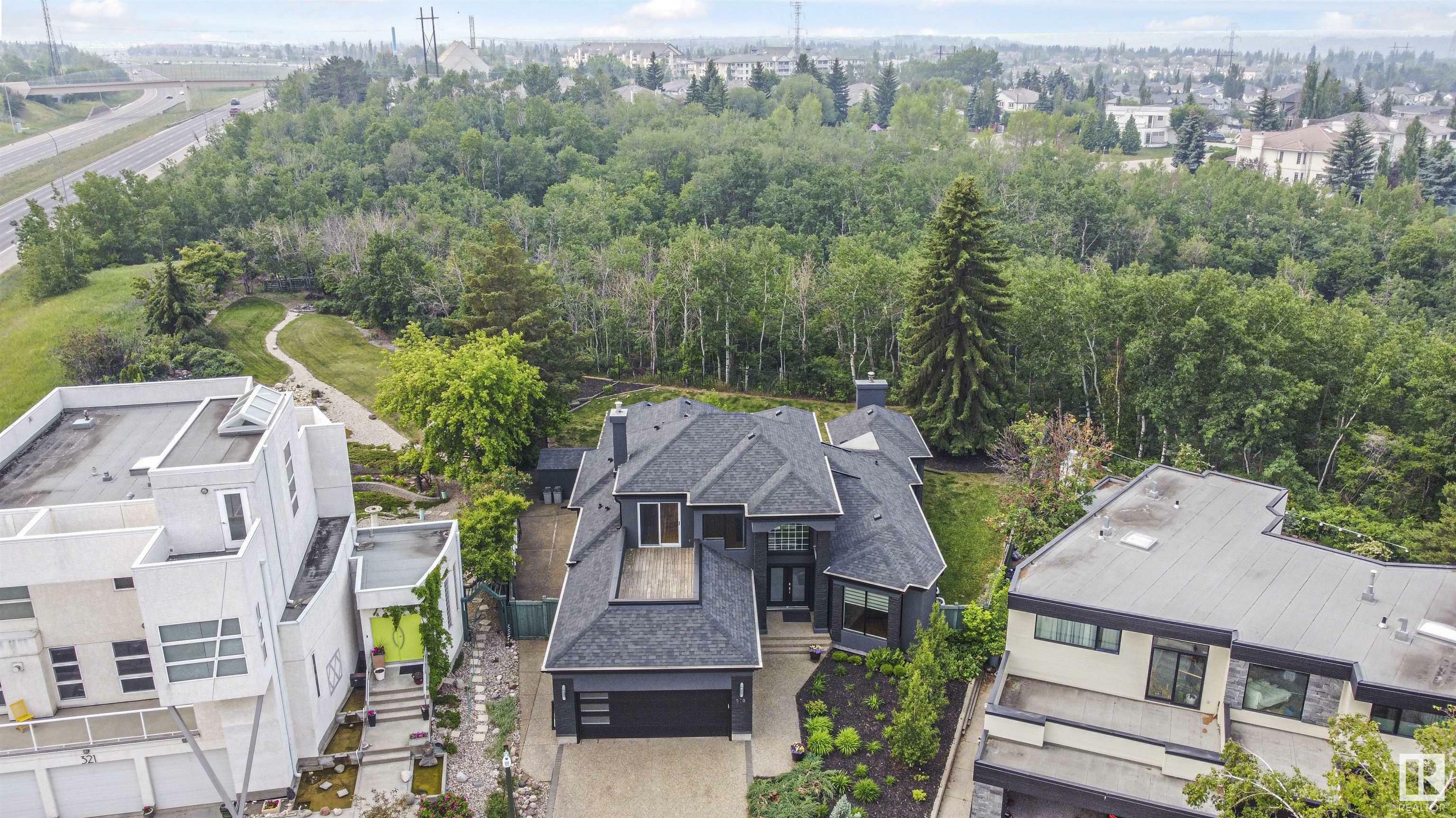 Property Photo: 319 Ferris Way NW AB T6R 2C4
