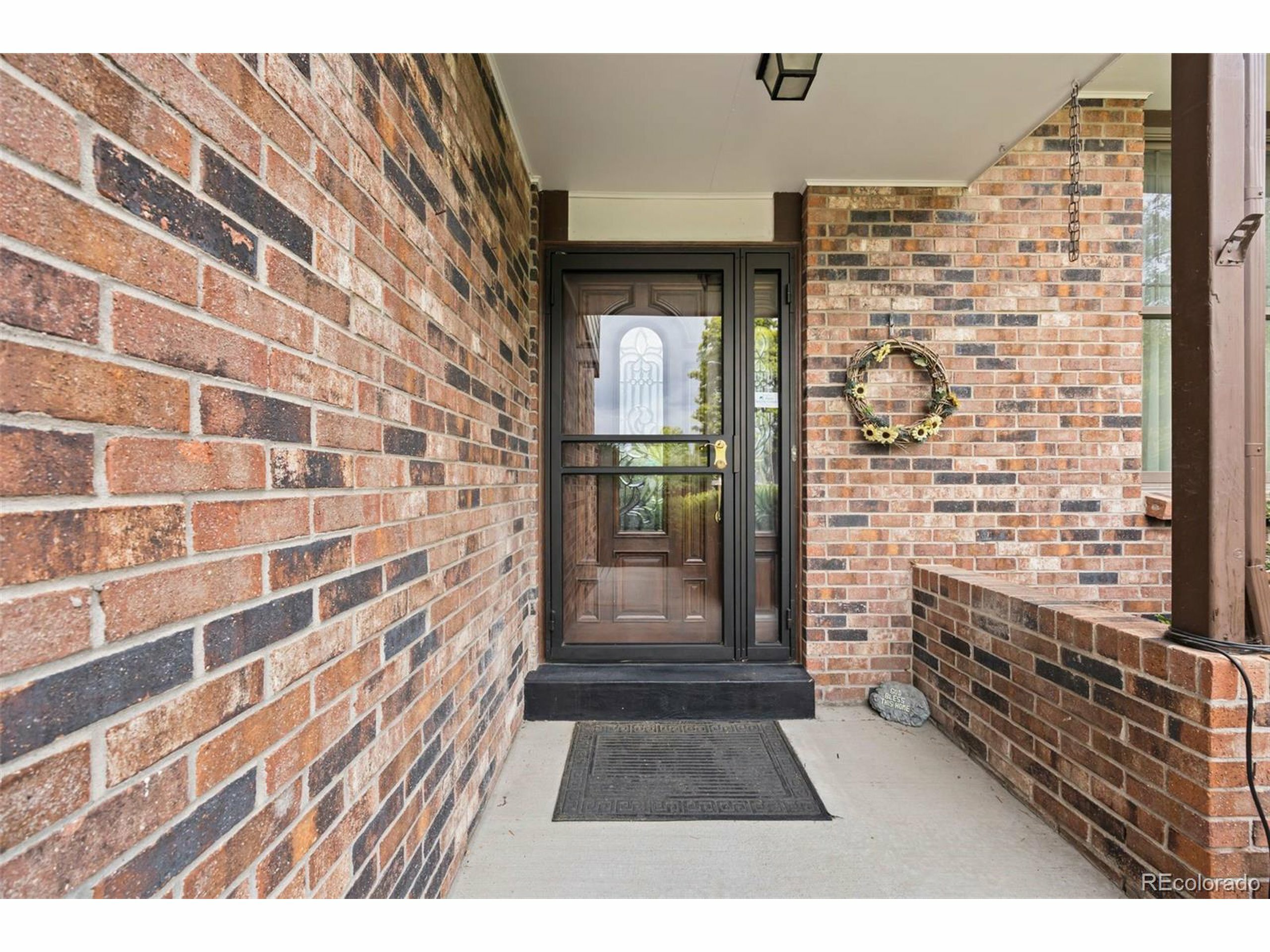 Property Photo: 4677 S Wolff St CO 80236