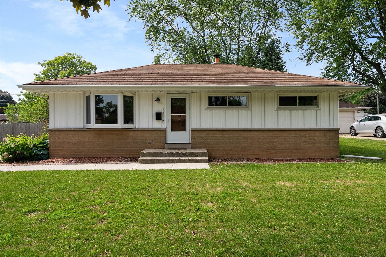 Property Photo:  8811 W Lawn Ave  WI 53225 