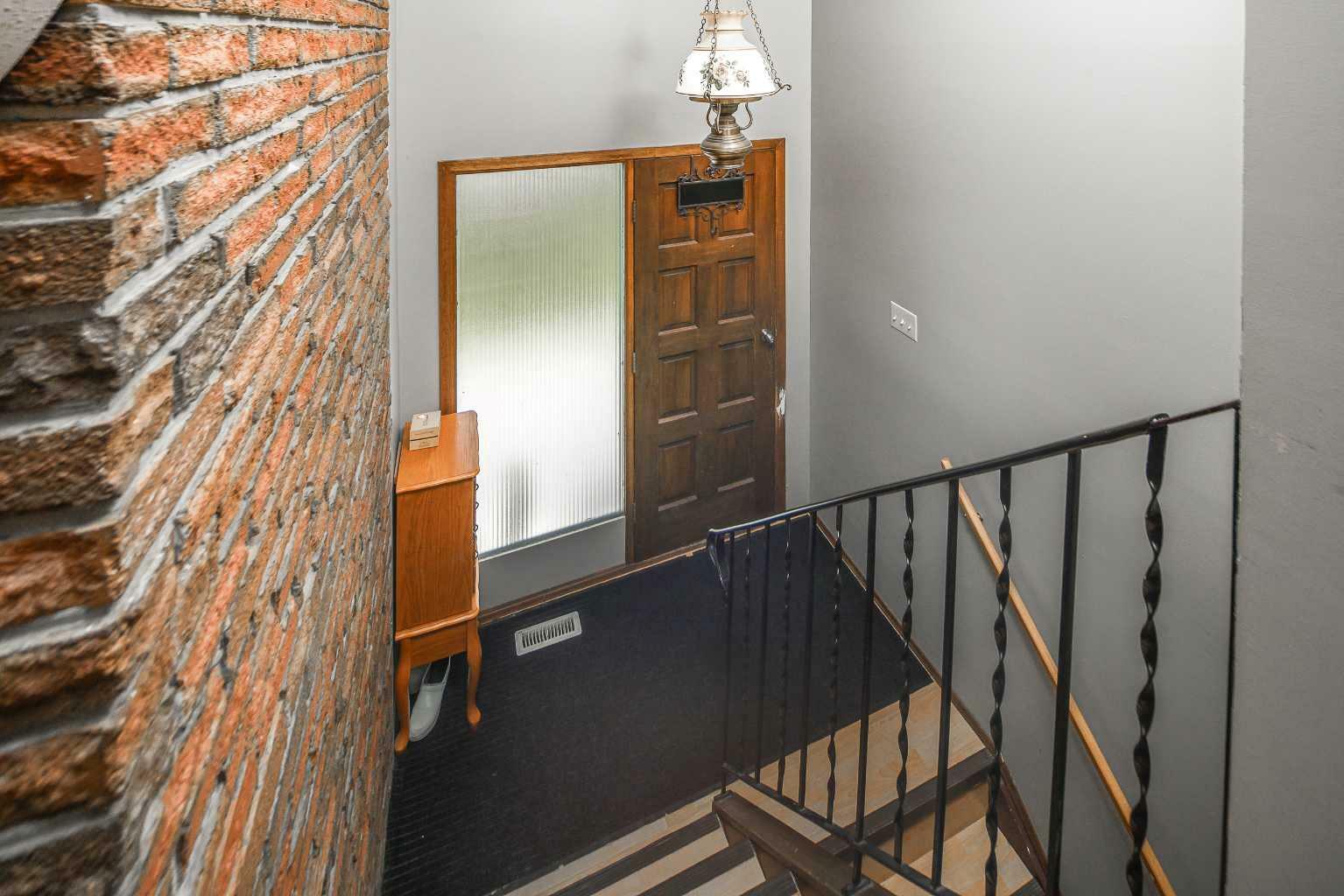 Property Photo: 262057 Poplar Hill Drive AB T3R 1C7