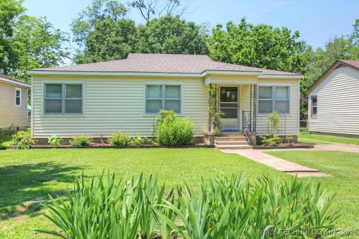 Property Photo: 708 S Pecan Street OK 74048