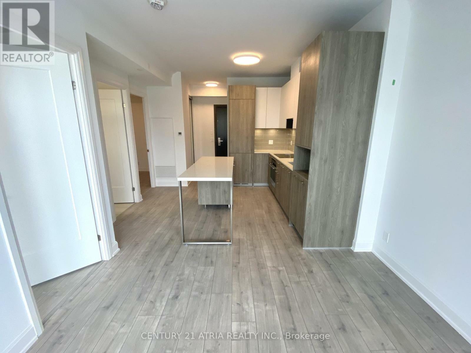 Property Photo: 38 Water Walk Drive 211 ON L3R 6M8