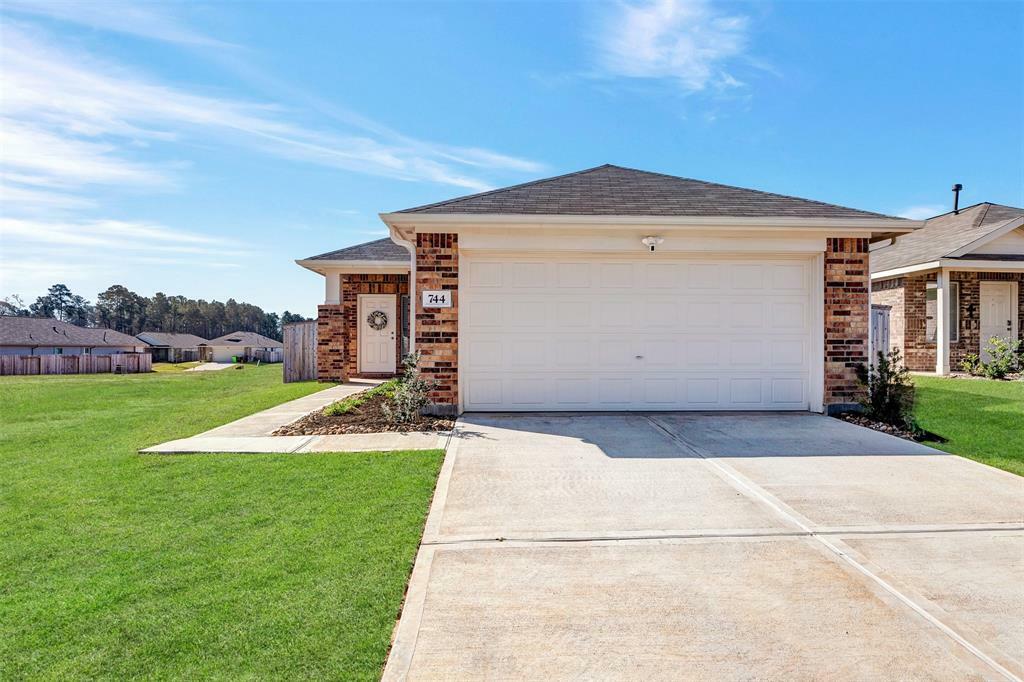 Property Photo: 744 Hackberry Branch Court TX 77354