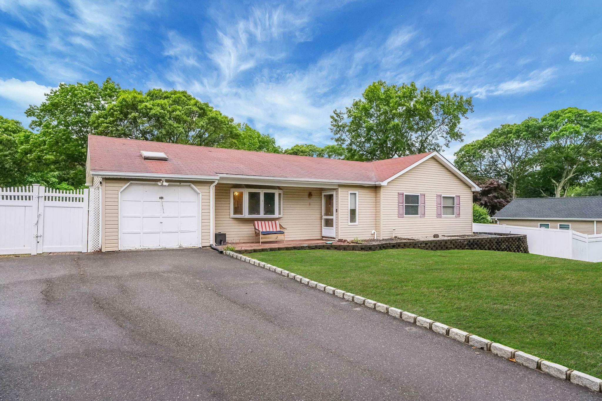 Property Photo: 8 Peconic Lane NY 11784