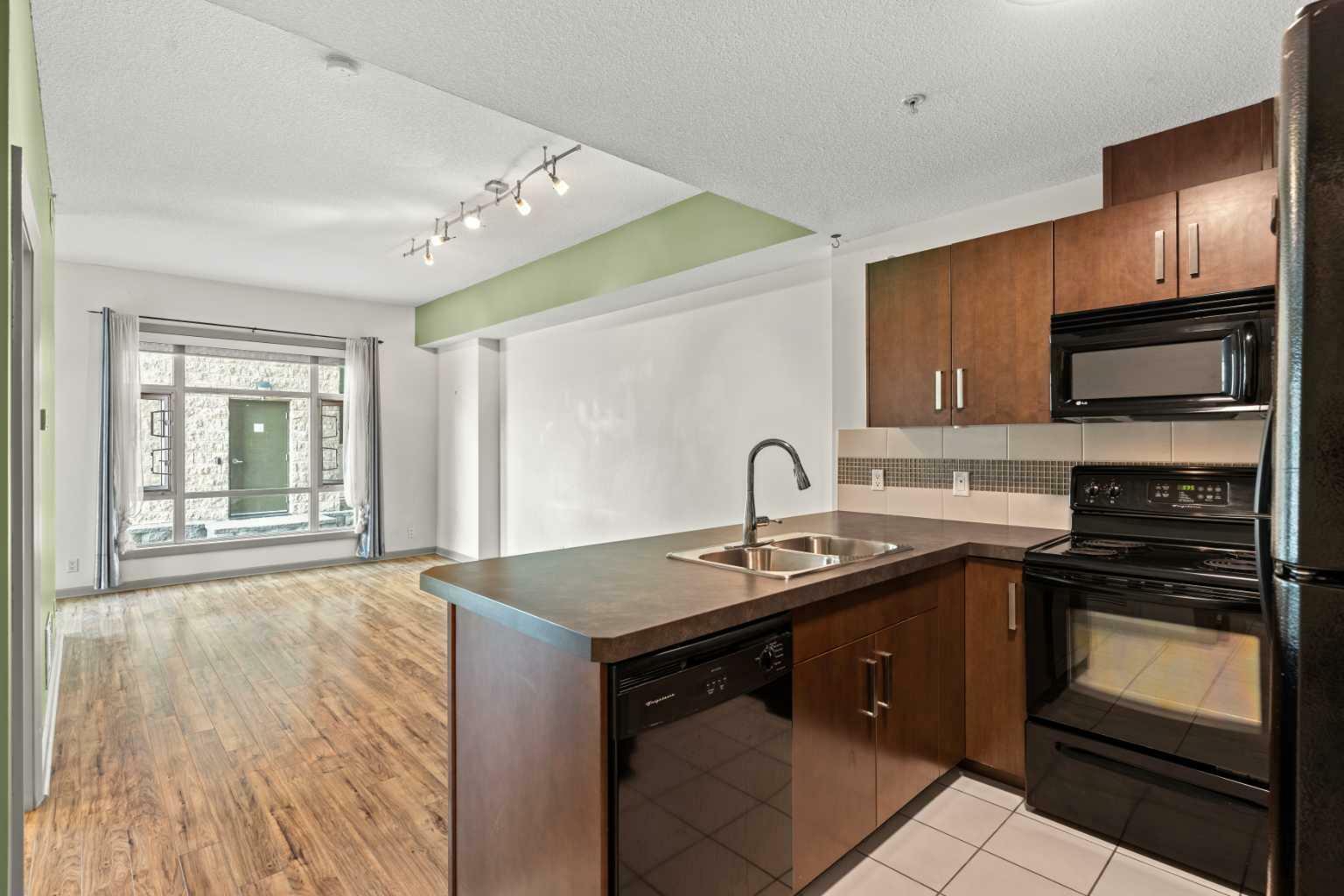 Photo de la propriété: 210 15 Avenue 202 AB T2G 0B5