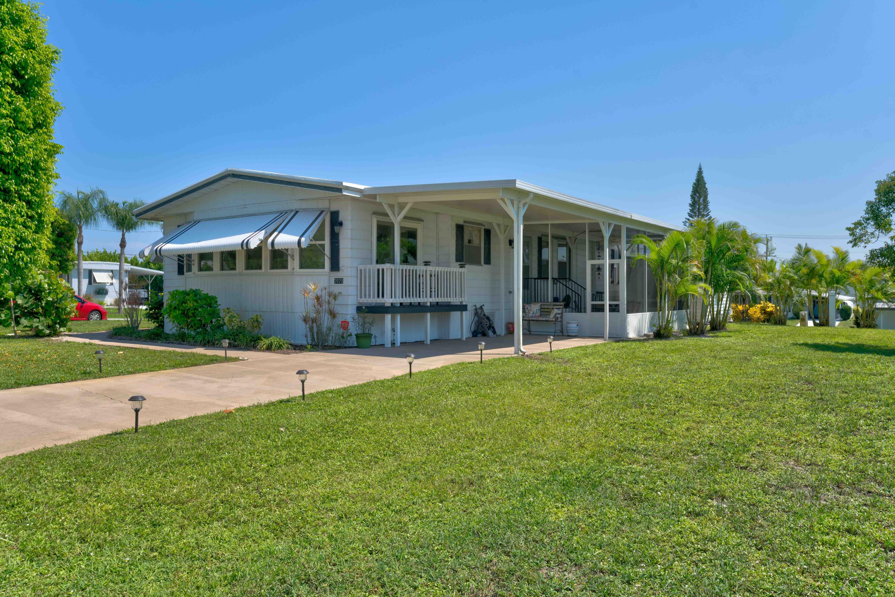 Property Photo: 7075 SE Bluebird Circle FL 33455