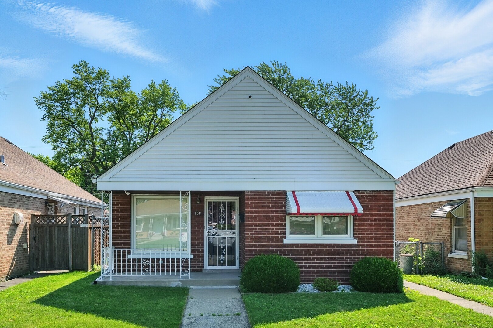 Property Photo: 409 50th Avenue IL 60104