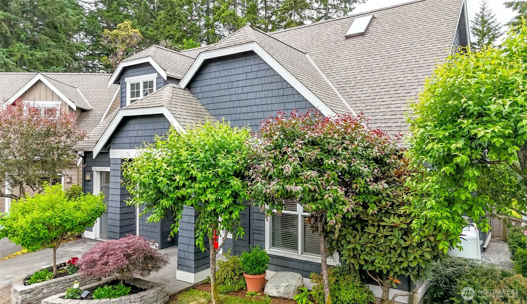 Property Photo:  1259  Shanti Lane NE 7  WA 98110 