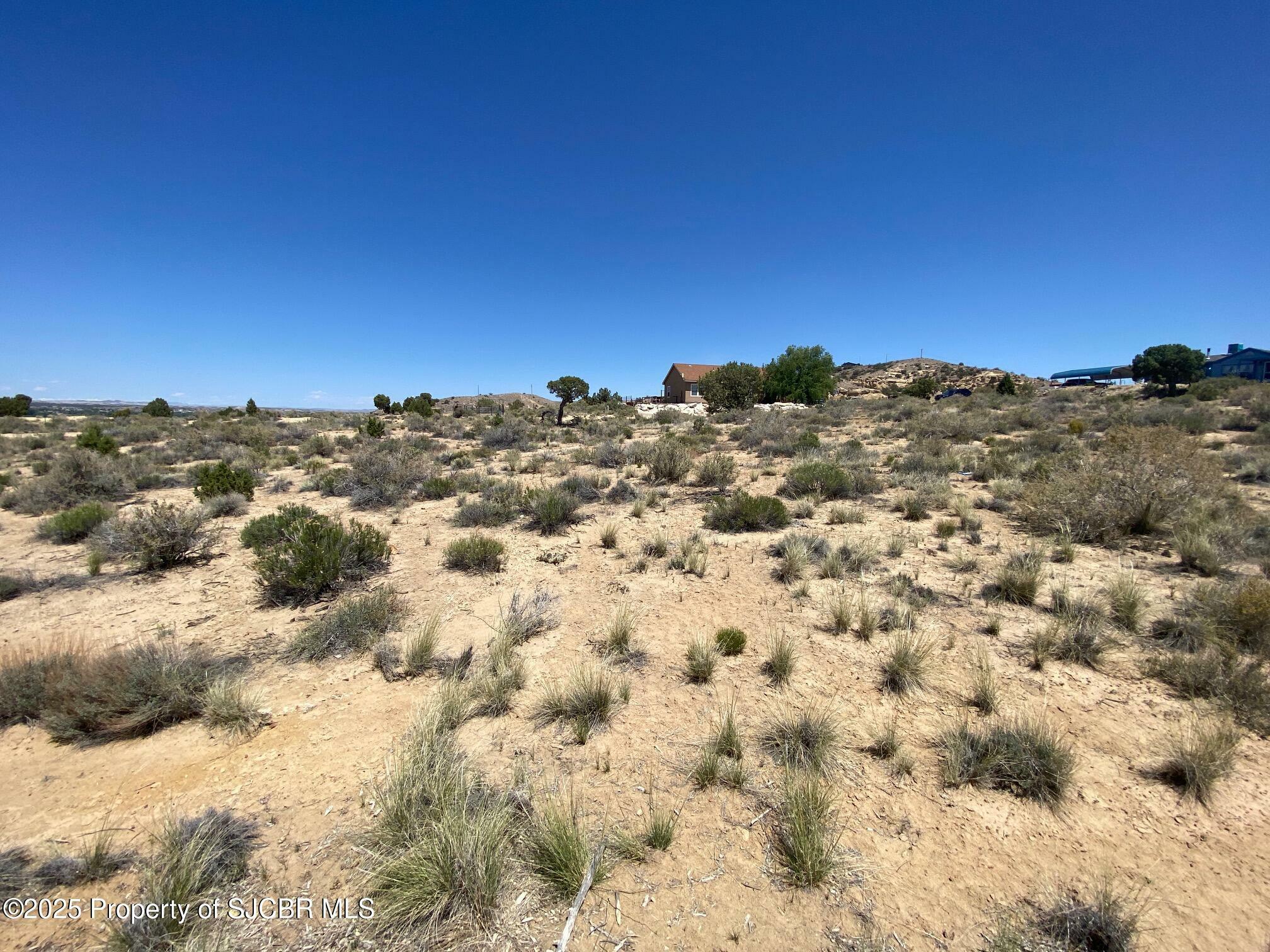 Property Photo: Lots 26-27 .69 Ac Road 34931 NM 87401