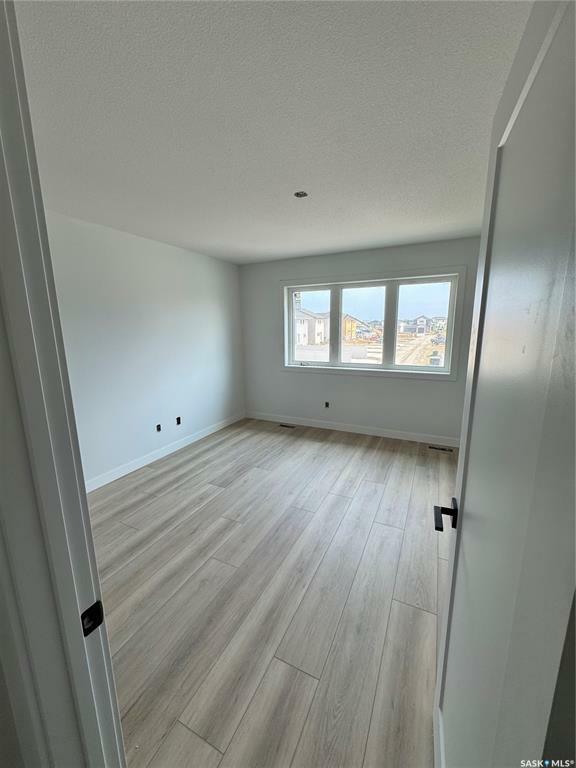 Property Photo: 114 Haverstock Crescent SK S7W 1E2