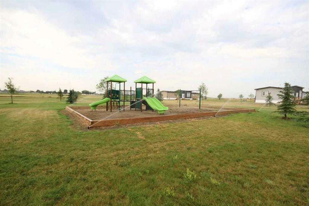 Photo de la propriété: 5 Meadows Way AB T1G 2A2