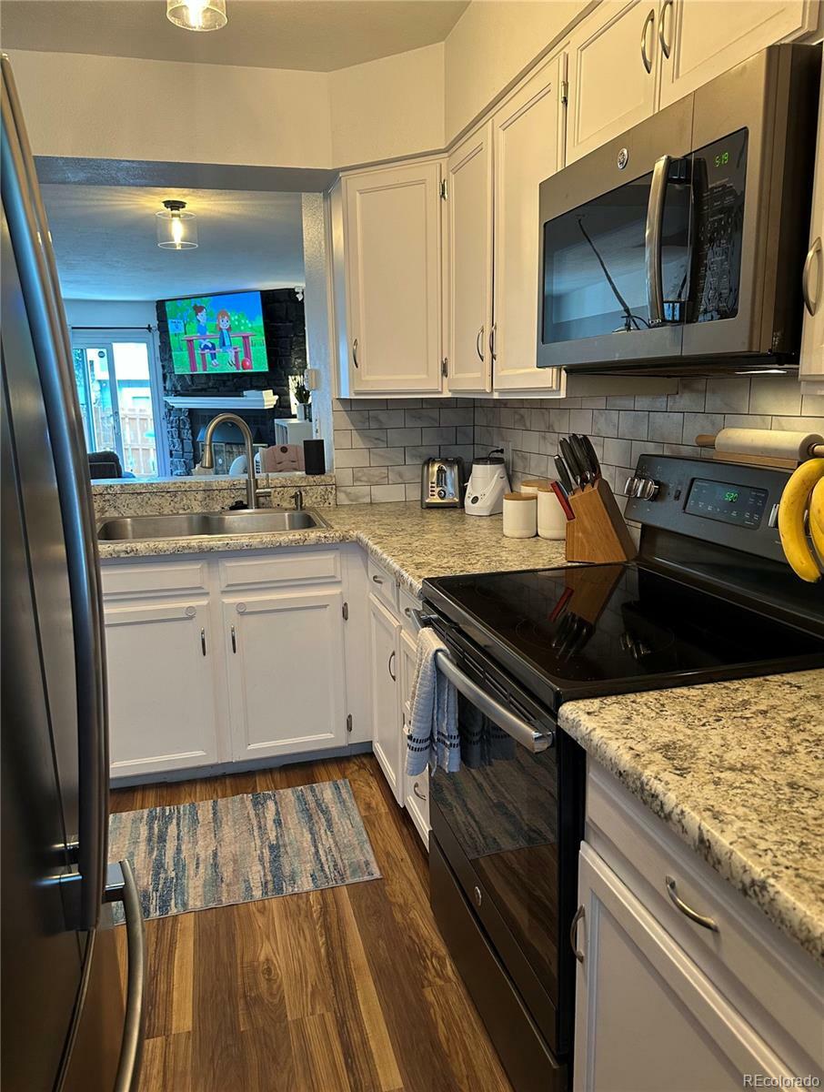 Property Photo: 15507 E Louisiana Avenue CO 80017