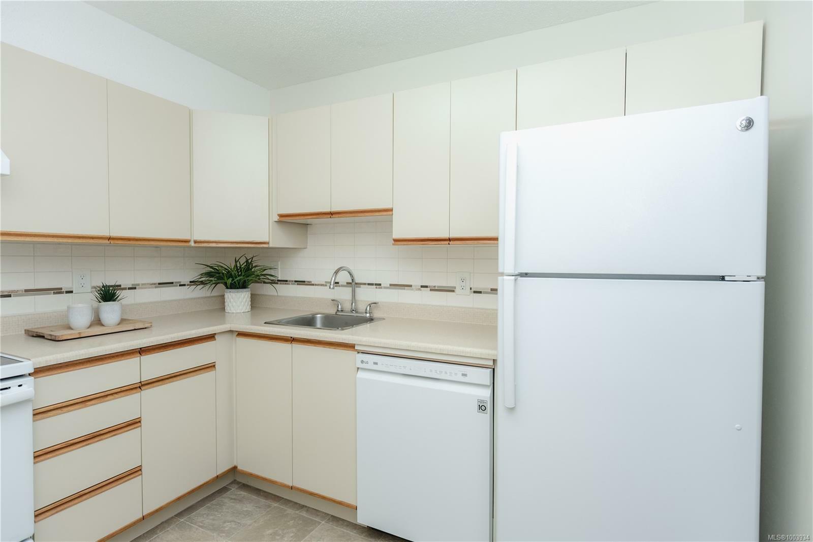 Property Photo: 6715 Dover Rd 410 BC V9V 1L9