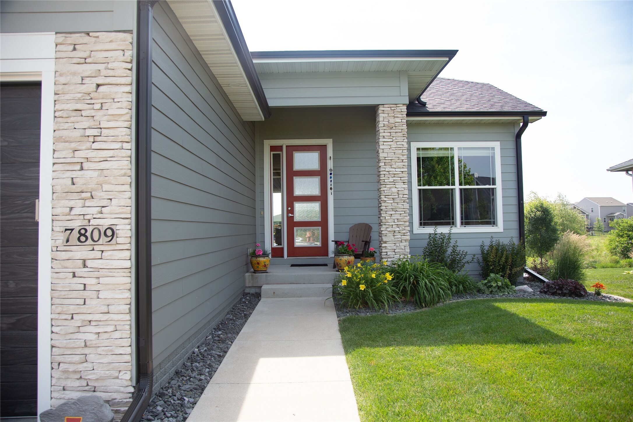 Property Photo:  7809 NW 96th Street  IA 50131 