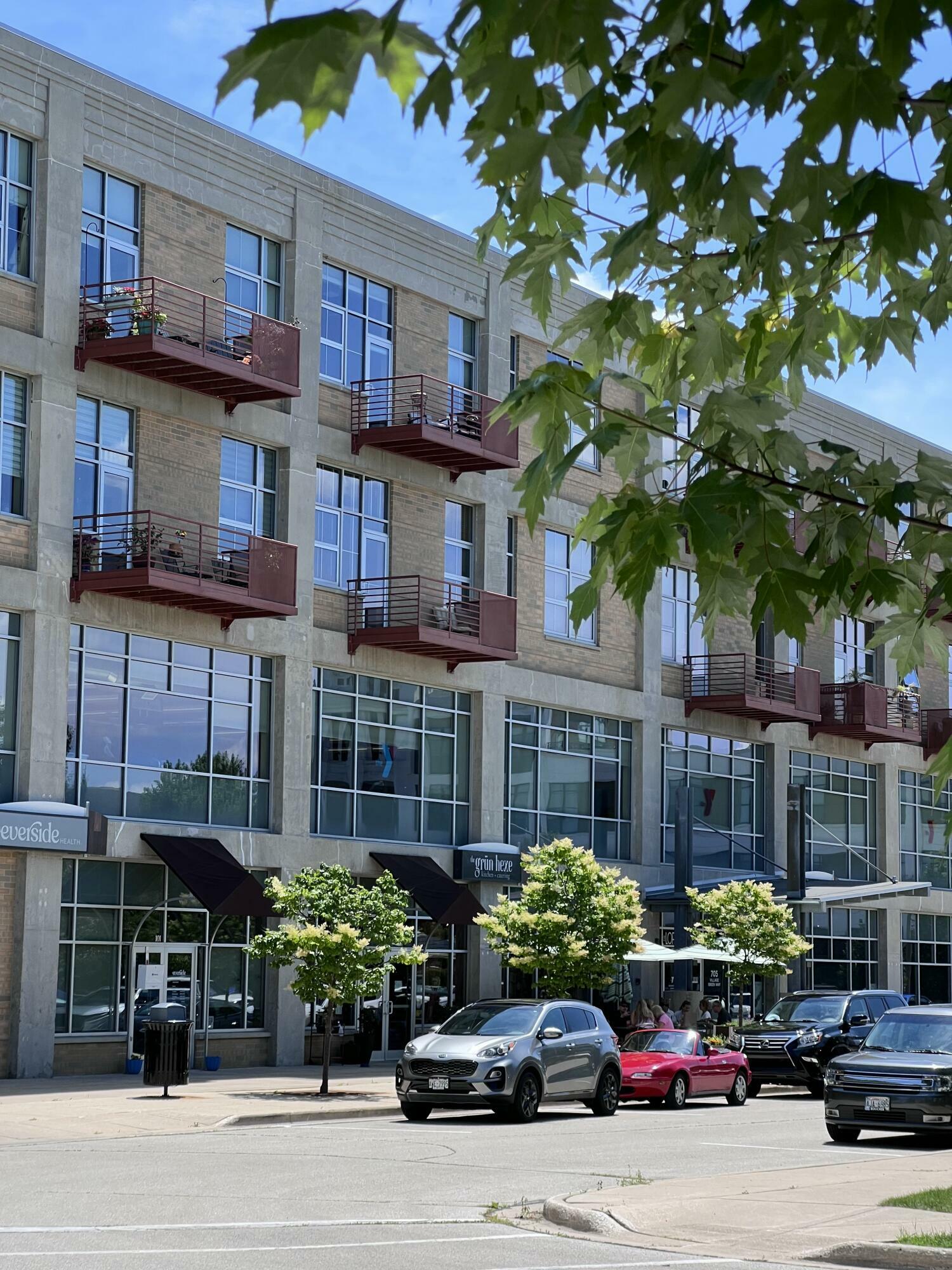 Property Photo:  705 Village Green Way 306  WI 53090 