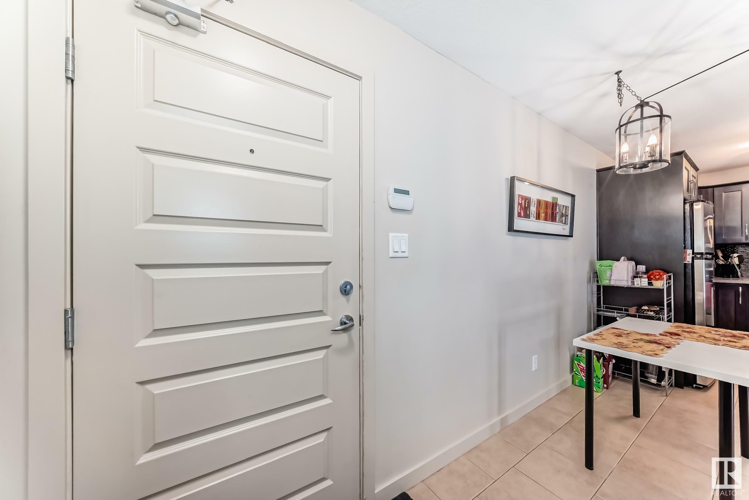 Property Photo: 11615 Ellerslie Road SW 106 AB T6W 0J3
