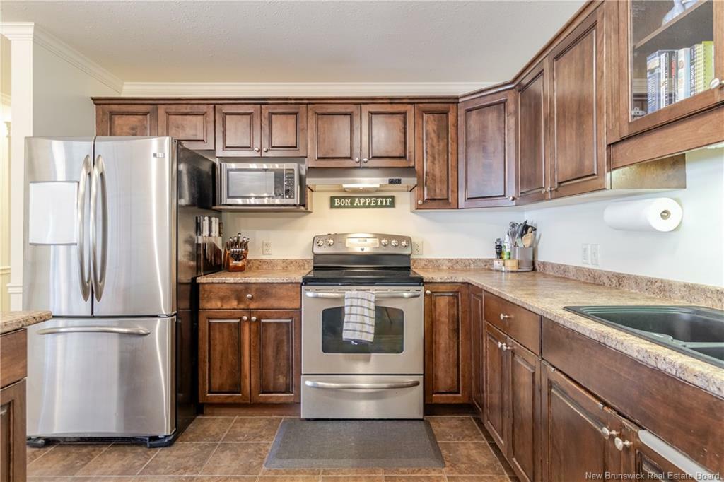 Property Photo: 130 Lian Street 103 NB E3C 0G4