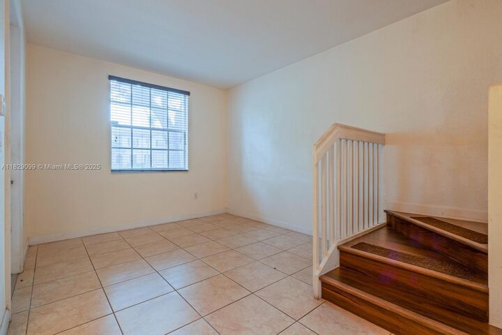 Property Photo: 9219 SW 227th St 9 FL 33190