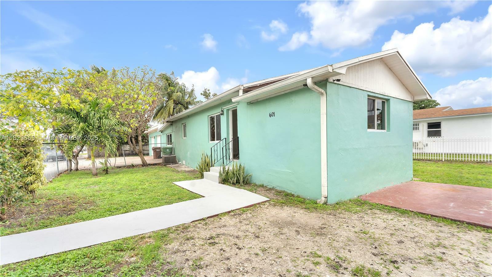 Property Photo: 601 SE 8th Pl FL 33010
