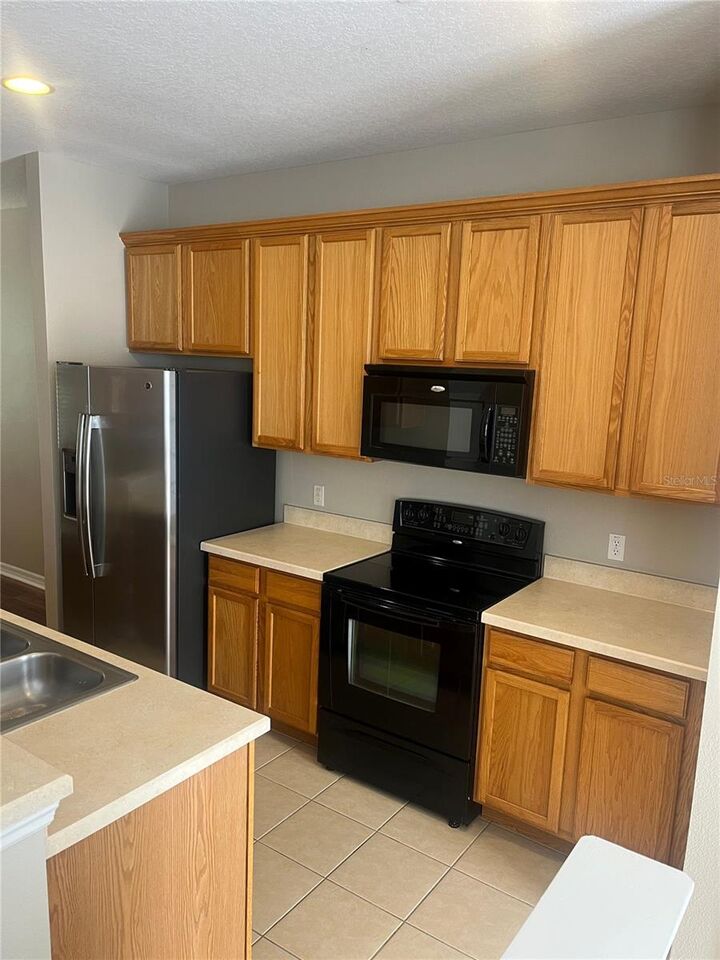Property Photo: 8409 Leeland Archer Boulevard FL 32836