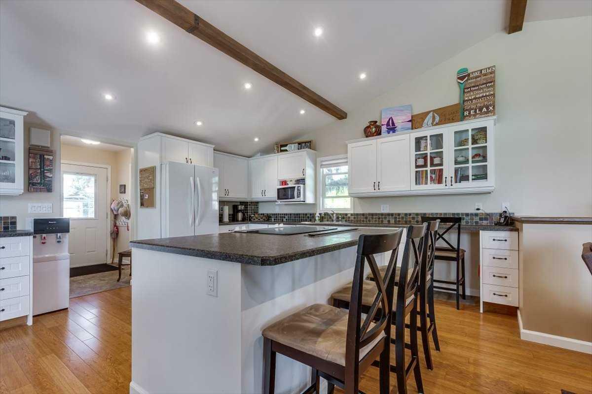 Property Photo: 36078 Range Road 245A 209 AB T0M 1R0