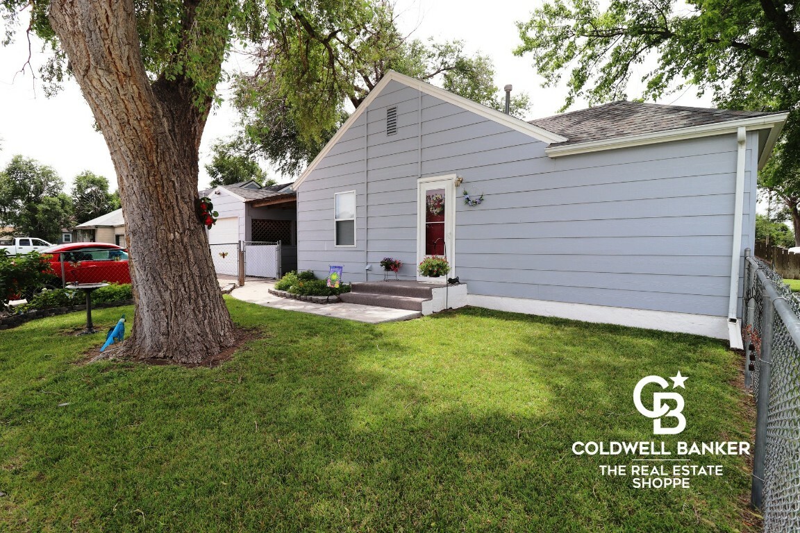 Property Photo:  310 Ballinger Street  KS 67846 